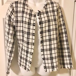 Jeuvre Black & White Plaid Jacket with a Fringe Finish all around
Size XL